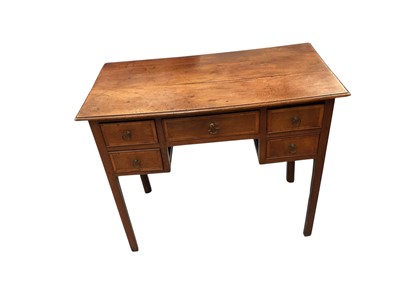 Lot 1450 - George III fruitwood and crossbanded lowboy, with five drawers to the kneehole on square internally chamfered legs, 86cm wide x 46cm deep x 73cm high