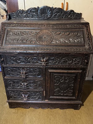 Lot 5239 - Late 19th century continental carved oak bureau