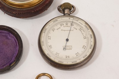 Lot 713 - Nine antique pocket barometers, various makers, including Victorian examples, some in leather cases