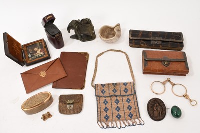 Lot 706 - Assorted works of art including Roman terracotta lamp of pinched form with collectors label to underside 'lamp from catacombs', Indian carved soapstone figure, silver mounted snakeskin purse, gu...