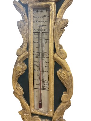 Lot 597 - 19th century continental carved and painted gilt wood and gesso barometer with dial and readings inscribed in French, 97cm high