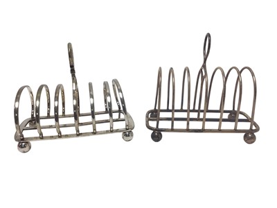 Lot 260 - Victorian silver six division toast rack of hooped form, with central carrying handle