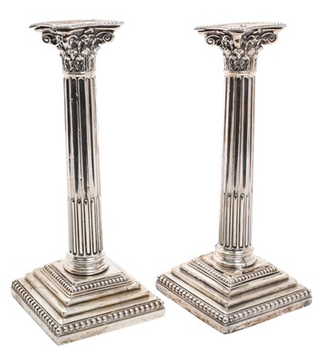 Lot 261 - Pair Victorian silver Corinthian column candlesticks on square stepped bases, separate sconces