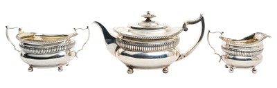 Lot 265 - George III silver three piece tea set