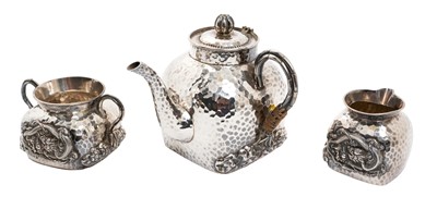 Lot 266 - Late 19th / early 20th century Chinese silver three piece tea set