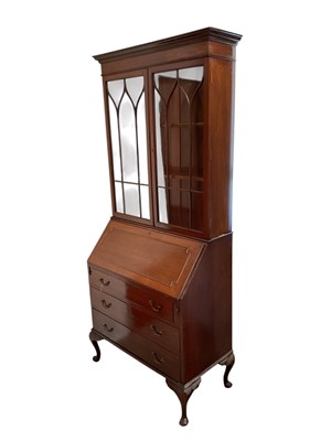 Lot 1460 - Georgian revival mahogany bureau bookcase