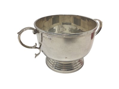 Lot 273 - 1920s silver bowl, with twin leaf mounted handles, on a stepped circular base (Birimingham 1927)