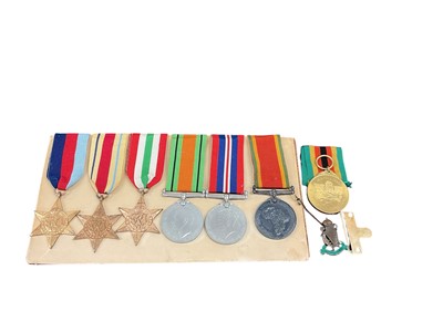 Lot 721 - Second World War medal group comprising 1939 - 1945 Star, Africa Star, Italy Star, Defence, War and Africa Service medal, all named to 327233 E. J. Crampton