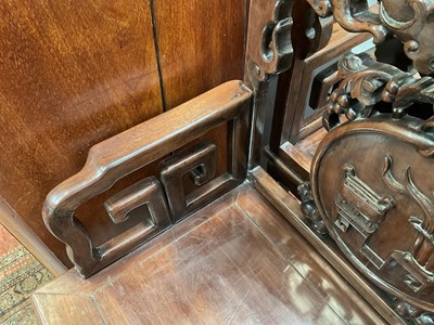 Lot 1257 - Pair of early 20th century Chinese hardwood elbow chairs