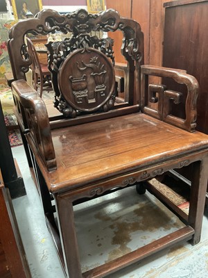 Lot 1257 - Pair of early 20th century Chinese hardwood elbow chairs