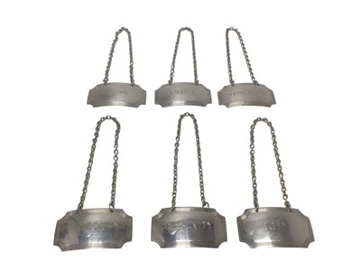 Lot 278 - Set of six contemporary silver decanter labels of rectangular form, with reeded borders