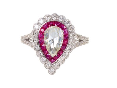 Lot Diamond and ruby cluster ring with a central pear-cut diamond surrounded by a border of calibre cut rubies and a further border of brilliant cut diamonds in 18ct white gold setting, ring size P½...