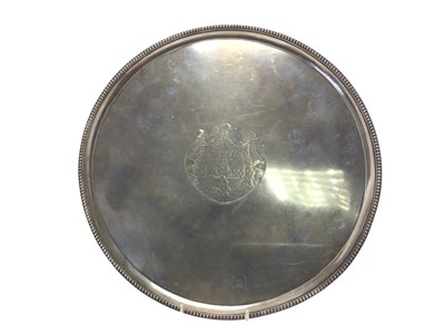 Lot 281 - Large George III silver salver of circular form, with engraved armorial shield, and bead border