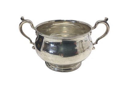 Lot 282 - Late 1930s silver bowl of baluster form, with twin scroll handles and engraved inscription