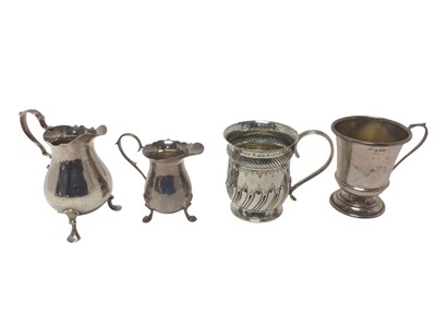 Lot 293 - George II silver cream jug, together with a contemporary silver cream jug of similar form