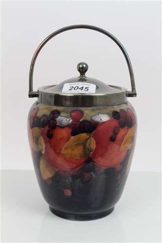 Lot 2045 - Moorcroft Pottery biscuit barrel decorated in...