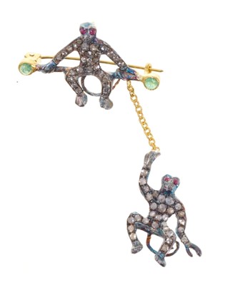 Lot 469 - An emerald, ruby and diamond monkey brooch / pendant Emerald, ruby and diamond novelty monkey brooch / pendant, designed as a monkey...