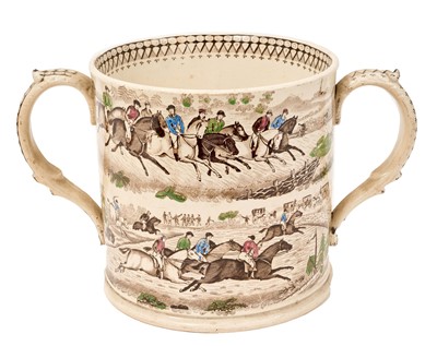 Lot 920 - Early 19th century two handled pottery loving cup decorated with steeple chasing scenes, 16cm high