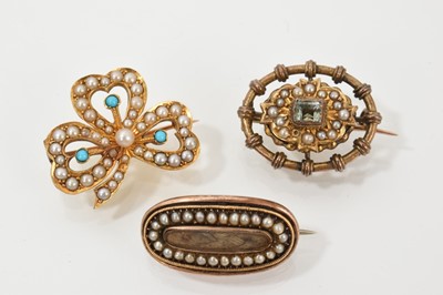 Lot 501 - Late Victorian gold seed pearl and turquoise clover leaf brooch, Georgian gold and seed pearl mourning brooch and a Victorian 15ct gold and seed pearl brooch (3)