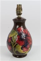 Lot 2048 - Moorcroft Pottery lamp decorated in the...