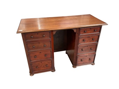 Lot 1468 - Victorian mahogany kneehole desk with eight drawers