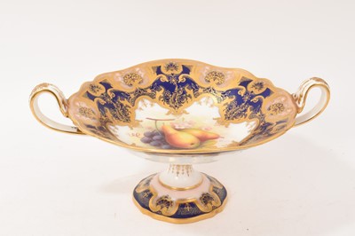 Lot 104 - Early 20th century Royal Worcester hand painted comport, painted with fruit by Shuck on a gilt and cobalt ground