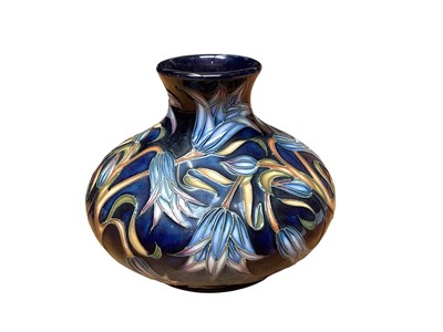 Lot 1108 - Moorcroft pottery limited edition vase decorated in the Carillion Blue pattern, 10.5cm high