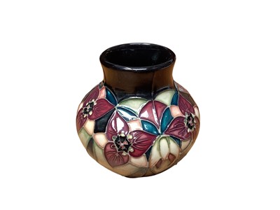 Lot 1110 - Moorcroft pottery vase decorated in the Trillium pattern, dated 2000, 8.5cm high