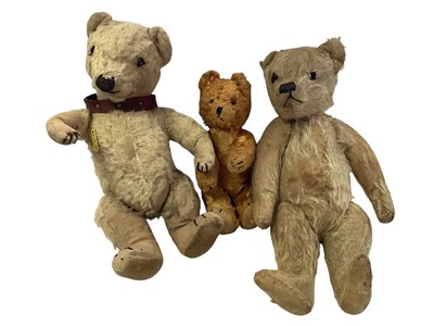 Lot 2056 - Two old mohair teddies, both have small hump, stitched noses and claws, disc jointed. Plus a small golden mohair bear