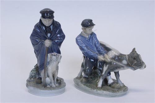 Lot 2055 - Two Royal Copenhagen figures - boy with dog no....