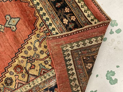Lot 1496 - Sultanabad rug, with central diamond medallion on brick red ground, 340 x 174cm