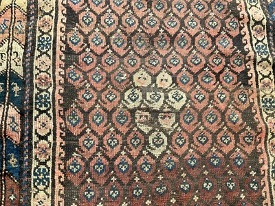 Lot 1497 - Antique Persian runner, with boteh ground in geometric borders, 280 x 110cm