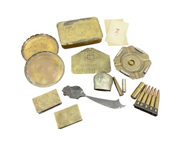 Lot 685 - First World War Princess Mary Gift tin, together with two brass Trench Art match box covers and other Trench Art items, (1 box).