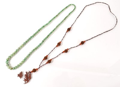 Lot 475 - Jade or Jadeite necklace and another necklace. Provenance: brought to the UK from China in the early part of the 20th century