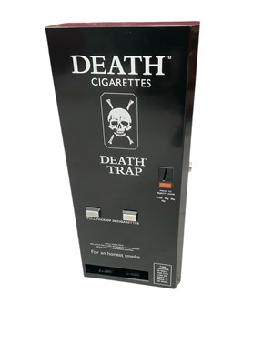 Lot 2459 - 1980s advertising Death Trap cigarette dispenser machine for Death Cigarettes, together with three Death comics