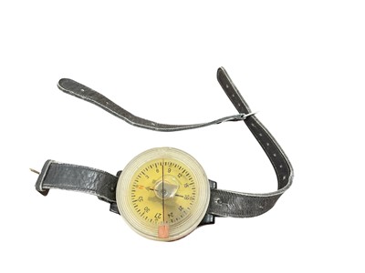 Lot 743 - Second World War German Nazi Luftwaffe Kadlec arm band compass. Number on reverse: AK 39, Fl 23235-1., on original leather strap.