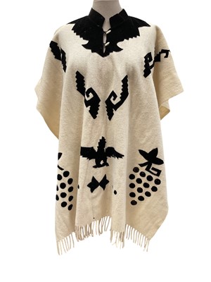 Lot 2111 - Mexican woven wool poncho with applique black velvet motifs, circa 1920s.