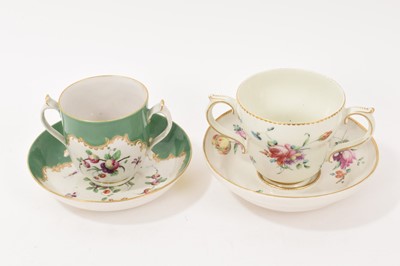 Lot 13 - Chelsea Derby porcelain twin handle chocolate cup and saucer, c.1770, decorated in green with fruit and insects, gold anchor marks to base. Together with a Derby porcelain chocolate cup and sauc...