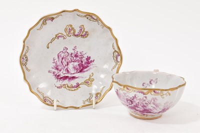 Lot 14 - 18th century faience cup and saucer, puce Camaieu decoration with gilt, in the style of Meissen, painted marks to base D / 14.