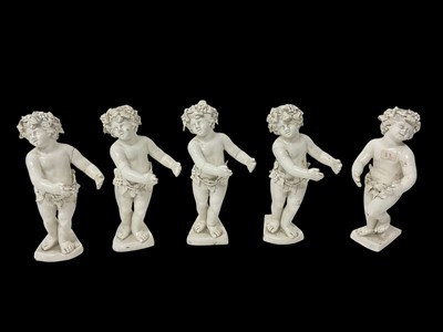 Lot 17 - Set of five 18th century continental white-glazed porcelain figures of putti, 17cm high.