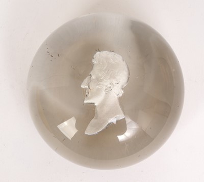 Lot 71 - Victorian glass sulphide paperweight decorated with a cameo portrait of the Duke of Wellington, 8.5cm diameter
