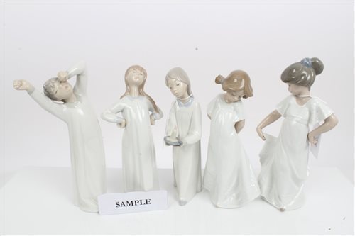 Lot 2075 - Seven Lladro porcelain figures - children in...