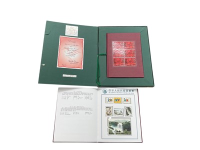 Lot 1425 - Postage Stamps Of The People’s Republic Of China, 2001 album. Together with one other presentation stamp album, Hong Kong Post 1997 Prestige Annual Stamp Album, no 279/500.