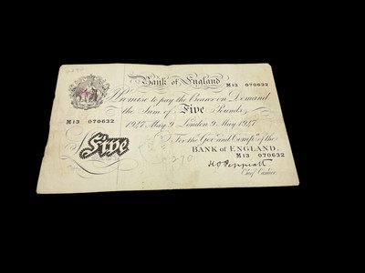 Lot 440 - G.B. - Bank of England Peppiatt white Five Pound banknote, London 9 May 1947, prefix M13 (N.B. Fold & pen marked on Obv: Ink stamped on reverse) otherwise F-GF (1 banknote)
