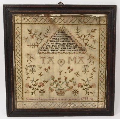 Lot 677 - 18th century needlework sampler, by Christian Arbutknot aged 11 years 1783. The needlework with floral sprays and initials either side of a heart, TA and MA, above a text in pyramid cartouche. I...