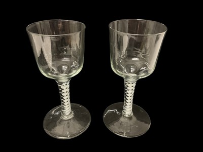 Lot 47 - Pair of large 18th century ale or wine glasses with opaque twist stems.