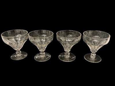 Lot 238 - Set of four large antique pan-top glass rummers, of large proportions, with lobed decoration