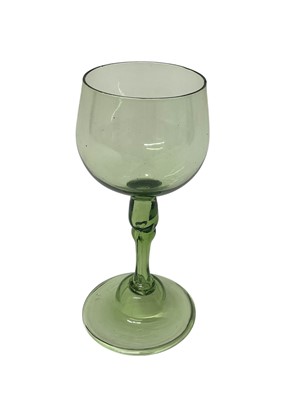 Lot 52 - 18th century English export green wine glass, c,1750-60, pale green, the tulip bowl on a slender hollowed knopped stem on a raised foot