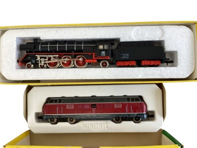 Lot 1914 - Minitrix N Gauge 4-6-2 DB black & red locomotives with eight wheel tender, No.2900, DB maroon & grey Bo-Bo diesel No.2960 and No.2024 (no coachwork), all boxed (3)