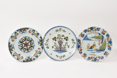 Lot 5 - 18th century English tin glazed pottery Ann Gomm pattern plate together with two other tin glazed plates (3)
